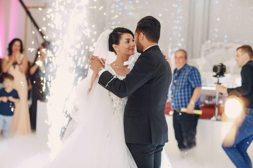 Bride and groom sharing their first dance surrounded by fog effects at a Dubai wedding | special effects for events in Dubai, UAE | Upshot SFX.s Low Fog Machine Rental in Dubai, UAE